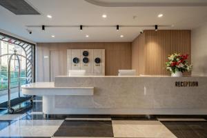 The lobby or reception area at Awen Lara Hotel Még 37 kép