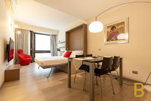 A seating area at BePlace Apartments in Duomo