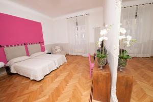 Posteľ alebo postele v izbe v ubytovaní Florian Rooms Guest House