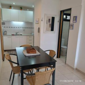 Kuchyň nebo kuchyňský kout v ubytování Alojamiento Del Real 2