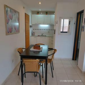 Kuchyň nebo kuchyňský kout v ubytování Alojamiento Del Real 2