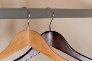 a pair of utensils hanging on a rack at Infinity Suites triple room 209 in Cancún
