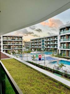 Swimmingpoolen hos eller tæt på MAKIA beach 115B Flat em Muro Alto PE