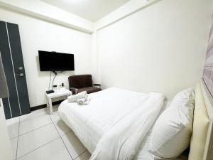 TV a/nebo společenská místnost v ubytování 逢甲玖壹住宿 Fengjia 91 house