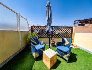 Część wypoczynkowa w obiekcie SunRise Den, a pie de playa, vista al mar y piscina