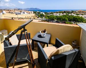 Balkon lub taras w obiekcie SunRise Den, a pie de playa, vista al mar y piscina