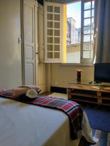Cama ou camas em um quarto em Guanaaní Hostel
