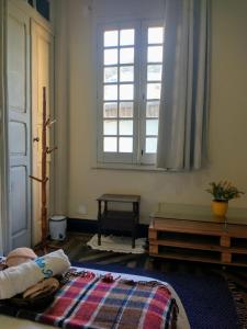 Cama ou camas em um quarto em Guanaaní Hostel