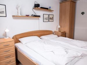 Postel nebo postele na pokoji v ubytování Holiday Home Klaffmuschel by Interhome