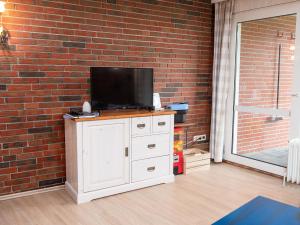 TV a/nebo společenská místnost v ubytování Holiday Home Klaffmuschel by Interhome