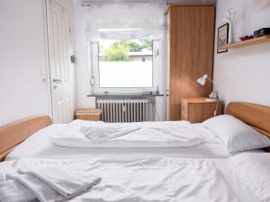Postel nebo postele na pokoji v ubytování Holiday Home Klaffmuschel by Interhome