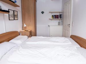 Postel nebo postele na pokoji v ubytování Holiday Home Klaffmuschel by Interhome