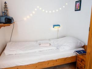 Postel nebo postele na pokoji v ubytování Holiday Home Klaffmuschel by Interhome