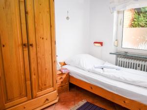 Postel nebo postele na pokoji v ubytování Holiday Home Klaffmuschel by Interhome