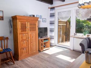 Μια τηλεόραση ή/και κέντρο ψυχαγωγίας στο Holiday Home Müter by Interhome