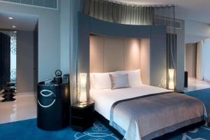 Letto o letti in una camera di W Doha