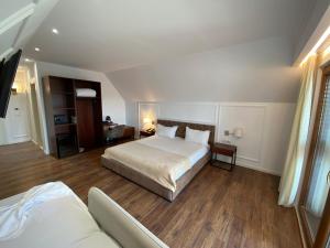 Voodi või voodid majutusasutuse Hotel Vila Zeus toas