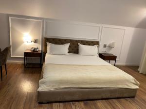 Voodi või voodid majutusasutuse Hotel Vila Zeus toas