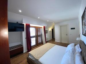 Voodi või voodid majutusasutuse Hotel Vila Zeus toas