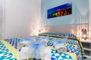 Postel nebo postele na pokoji v ubytování B&B Casa 28