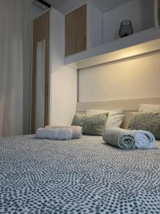 Posteľ alebo postele v izbe v ubytovaní Apartman Hrusta Crikvenica