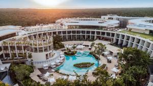 an aerial view of a resort with a swimming pool at Secrets Tulum Resort & Beach Club - Adults Only - All Inclusive in Tulum