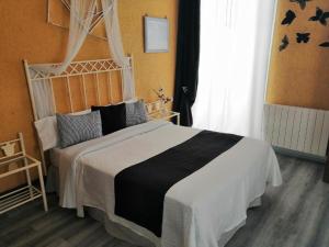 Posteľ alebo postele v izbe v ubytovaní Hospedaje Botin