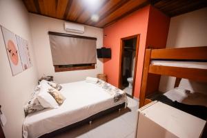 Ένα ή περισσότερα κρεβάτια σε δωμάτιο στο Pousada Hymbe +35 φωτογραφίες