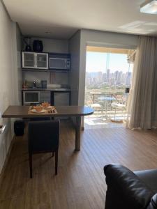 Χώρος καθιστικού στο Flat Parque Areião 2405