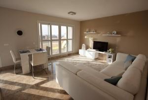 Posezení v ubytování Almerimar Porto Fino - Appartement de luxe, vue mer