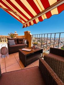 Posezení v ubytování Almerimar Porto Fino - Appartement de luxe, vue mer