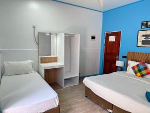 Voodi või voodid majutusasutuse Ithaa Seaview toas