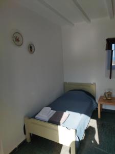 Postel nebo postele na pokoji v ubytování Kelia Analipsis