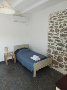 Postel nebo postele na pokoji v ubytování Kelia Analipsis