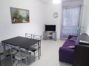 TV a/nebo společenská místnost v ubytování Casa al mare Cicerata + 17 fotografií