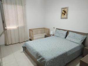 Postel nebo postele na pokoji v ubytování Casa al mare Cicerata