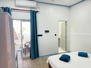 Voodi või voodid majutusasutuse Ithaa Seaview toas