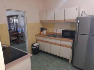 Kuchyň nebo kuchyňský kout v ubytování Spacious central and convinient Full AC + 17 fotografií