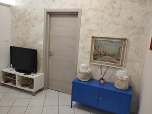 TV a/nebo společenská místnost v ubytování La Maison di Giusy