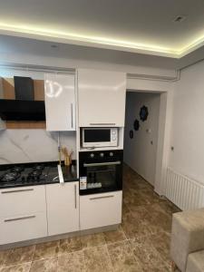 Kuchyň nebo kuchyňský kout v ubytování Appartement s2 a tunis