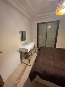 Postel nebo postele na pokoji v ubytování Appartement s2 a tunis
