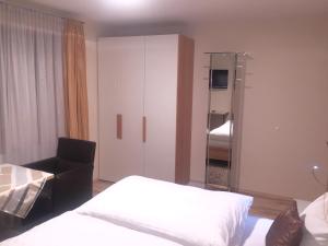A bed or beds in a room at Haus Zudrell