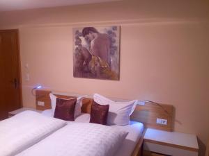 A bed or beds in a room at Haus Zudrell