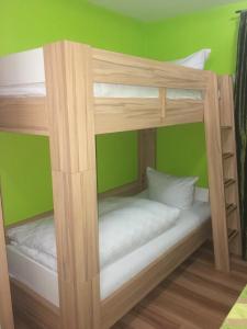 A bed or beds in a room at Haus Zudrell