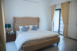 Postel nebo postele na pokoji v ubytování Poolside Villa