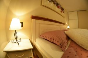 Postel nebo postele na pokoji v ubytování Apartment Arpa