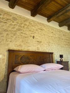 Postel nebo postele na pokoji v ubytování Chateaux de Pep