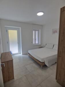 Postel nebo postele na pokoji v ubytování Imeri