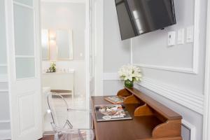 Uma TV ou centro de entretenimento em Casa Republica Barranco Boutique Hotel