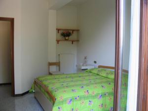 Un pat sau paturi într-o cameră la La Guardata
